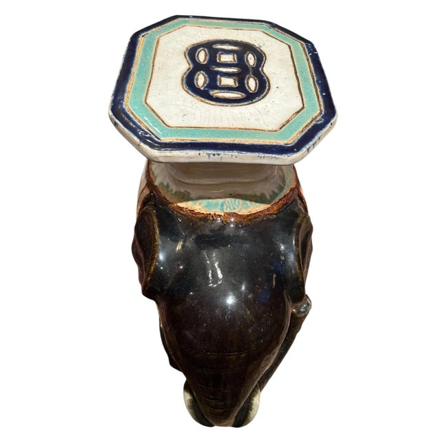 Large Antique Glazed Terracotta Elephant Garden Seat. This beautiful, large antique glazed ceramic elephant garden seat is...