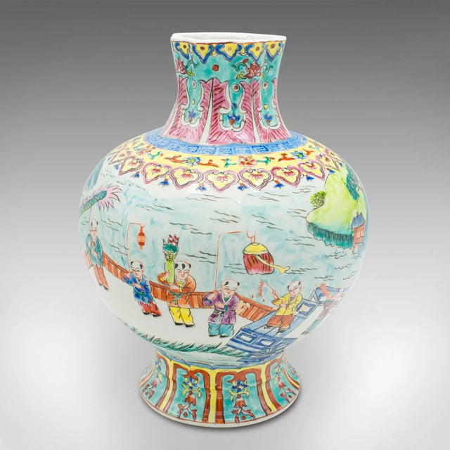 This is a vintage Oriental baluster vase. A Chinese, ceramic flower urn with polychrome enamel finish, dating to the late...