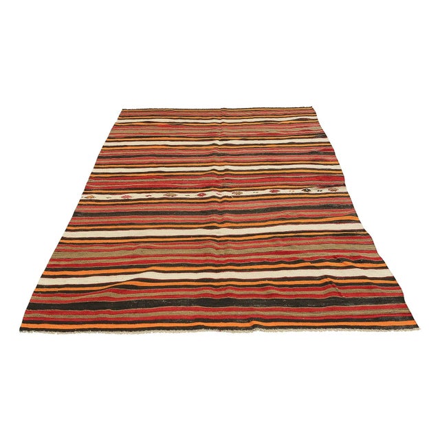 Handwoven vintage striped kilim rug from Denizli region of Turkey. Approximatelly 45-55 years old. In very good condition.
