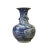 This is a Chinese decorative porcelain vase in Blue and White color finish. The theme is oriental dragons scenery graphic....