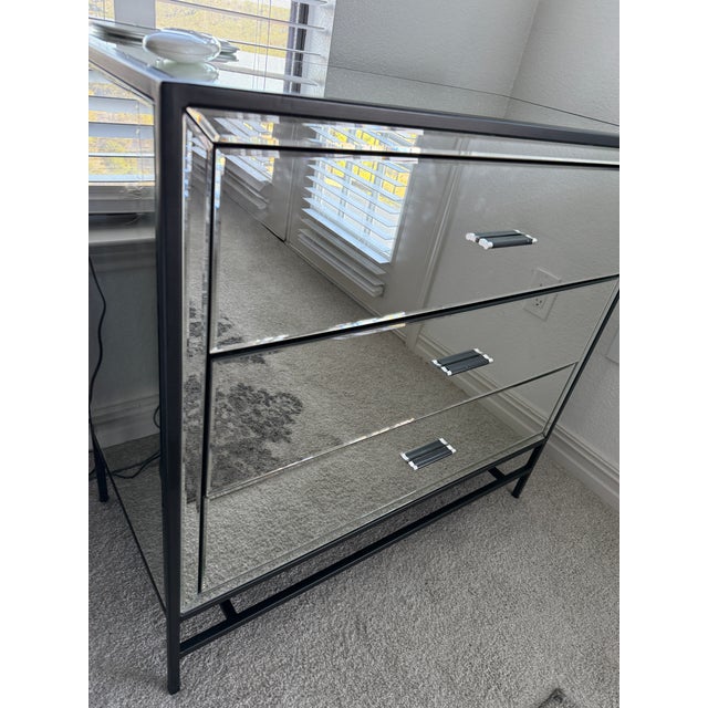 Bring a touch of Hollywood Regency glamour to your bedroom with this stunning pair of Upton Cabinet nightstands from High...