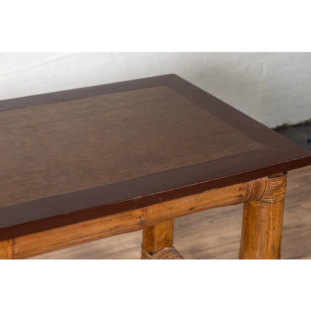 An antique Burmese bamboo altar console table in Japanese style from the early 20th century, with negora lacquer and...