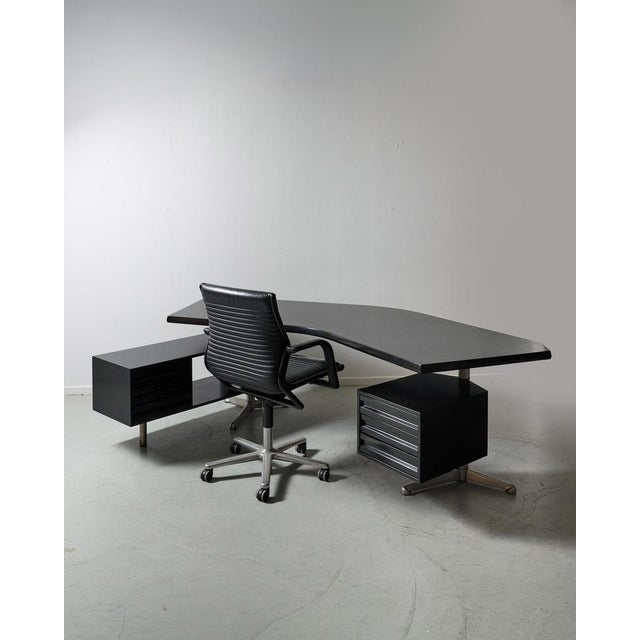 Iconic design ! Black Borsani Boomerang executive desk in excellent condtion. This piece is attributed to the mentioned...