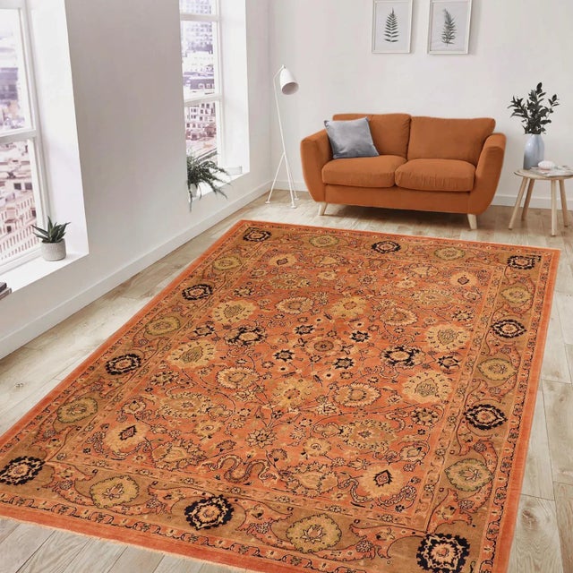 "Enhance the ambiance of your home with this magnificent Persian-influenced Turkish hand-knotted rug made by skilled...