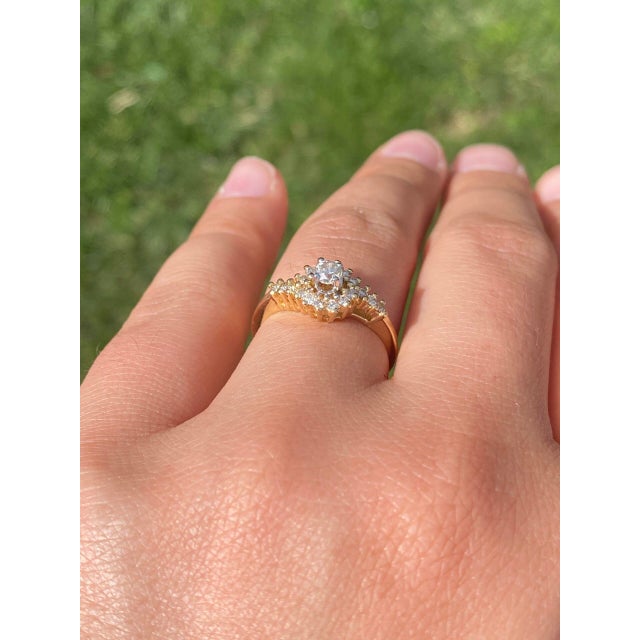 This stunning piece, known as The Timeless Bloom, features a captivating natural diamond at its center, complemented by...