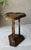 Excellent Pre-Owned Condition. This fabulous trefoil top pedestal cricket-style table was crafted by Butler Specialty...