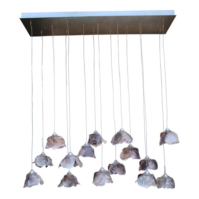 Currey & Company Catrice 15 Light Linear Pendant With Shell Shades For Sale