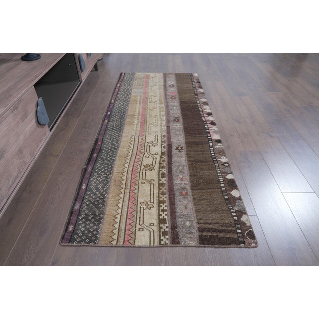 Add timeless character and bohemian elegance to your home with this one-of-a-kind vintage Anatolian patchwork kilim runner...
