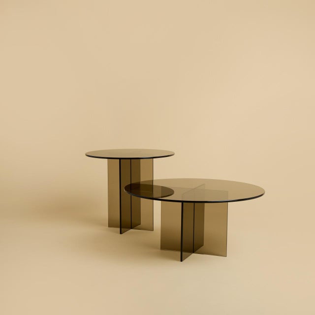 The Amami is a bronzed glass side table, an essay in lightness assembled entirely from Italian glass. Where Lebanto's...