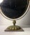 A nice early vintage brass vanity table mirror. Uncertain to origin. May possibly be Italian. It appears to have a fair...