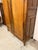 Impressive 18th-century French Louis XV style chestnut bonnet top armoire, dating to circa 1790, featuring a distinctive...