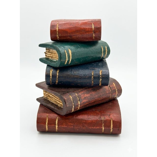 Miniature faux stack of books. Cute decorative accessory or paperweight.