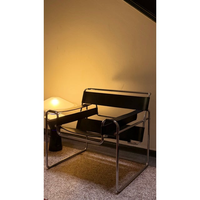 The legendary Wassily Lounge Chair by Marcel Breuer, in black leather, manufactured by Gavina (later part of Knoll), in...