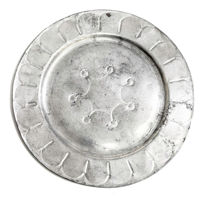 Dine in style with this vintage set of large tin plates with petal designs around rim and mid century geometric motif in...