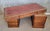 Warm glow to finish with old world charm to this mid 19th century Georgian desk. Tooled leather top, solid mahogany drawer...