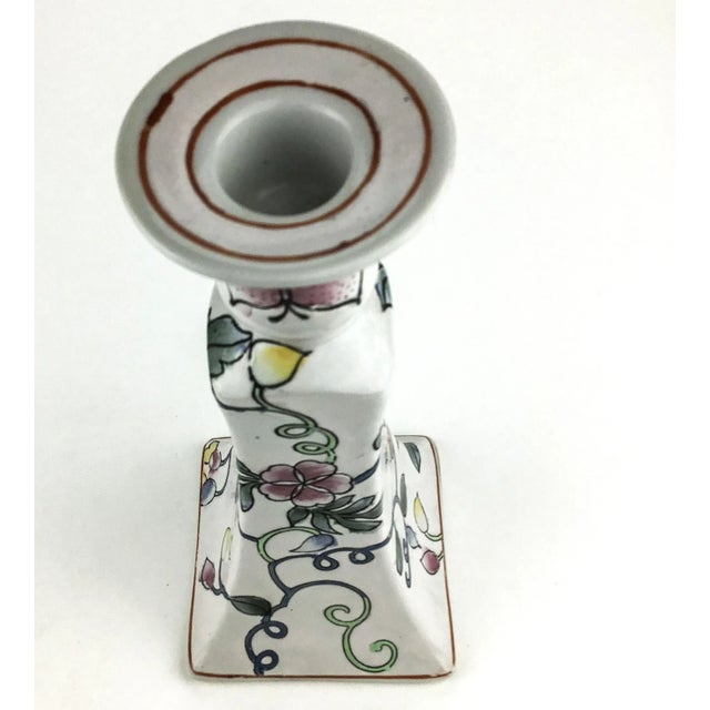 Gift worthy candlestick with details of butterflies and flowers intertwined all around the candle holder. Sits stable and...