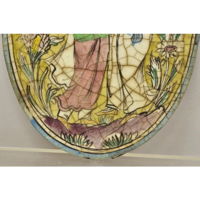 Early 20th Century Antique Persian Iznik Qajar Style Ceramic Pottery Oval Tile Hugging Couple C3 For Sale - Image 5 of 10