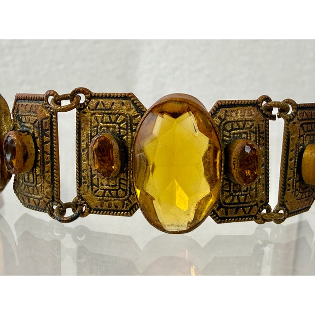 Antique Czech glass panel bracelet with bezel set citrine/amber glass stones. Signed “Made in Czechoslovakia”. Box clasp,...