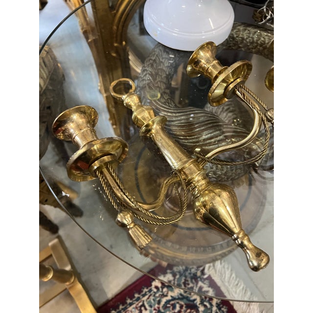 Up for consideration is a beautiful vintage pair of brass neoclassical sconces. This would look lovely in your home and it...