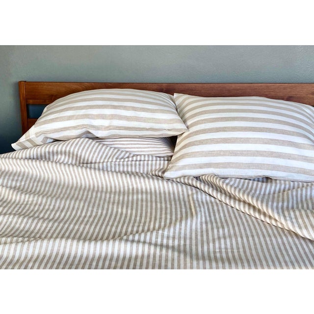 Cultivate an earthy, warm sophistication with the Madrid Tan collection by Modern Plum Home. Woven from premium 100% linen...