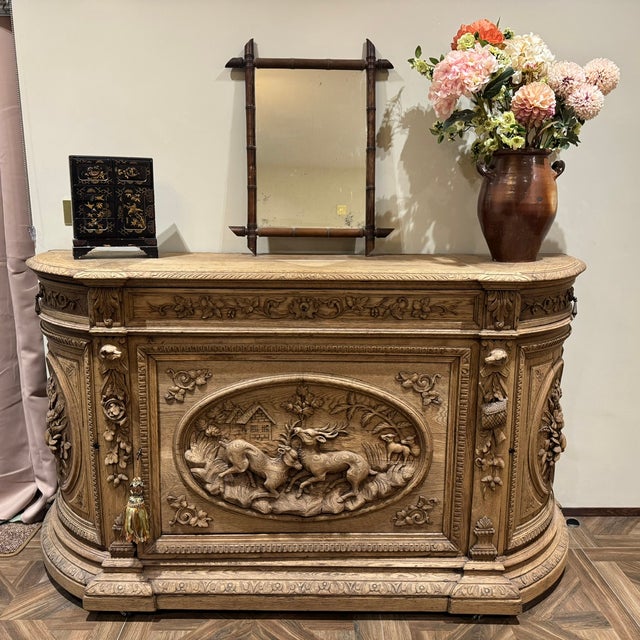 An extremely rare French hunting sideboard made from oak and dating to the mid 19th Century. Wonderful carvings , the...