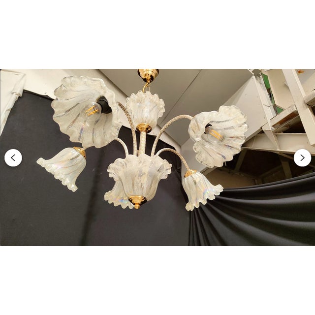 A most expressive and rare ceiling lamp, designed and created in the legendary murano-venezia ateliers. extremely limited...