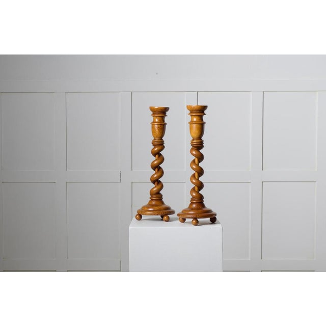 Pair of Swedish empire candlesticks from around 1840 to 1850. The candlesticks are made by hand with a frame in solid...