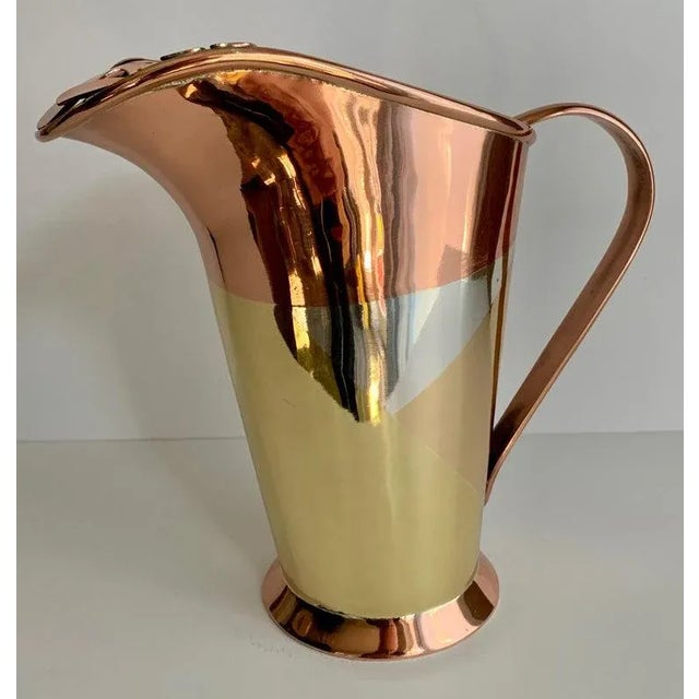 Multiple metal philodendron leaf handle Pitcher by Mexican Designer Los Castillo, Mexico - the pitcher is made of four...