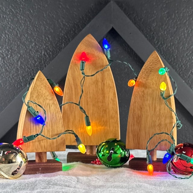 Boost your Modern Christmas decor game with a set of these handmade Teak and Walnut tabletop Christmas trees! These...