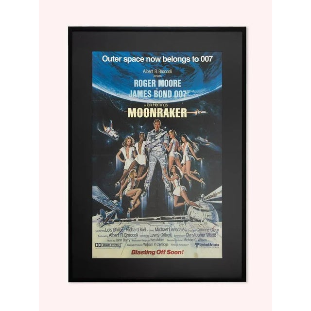 Original vintage announcement poster for the movie "Moonraker" (Blasting off soon) with Roger Moore as James Bond from...