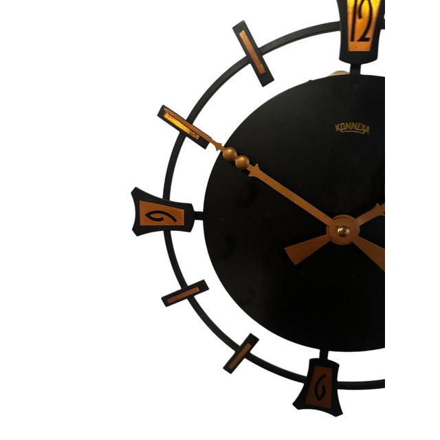 Beautifully crafted original highly polished copper & black aluminium clock by iconic timepiece maker konnexa from 1950....
