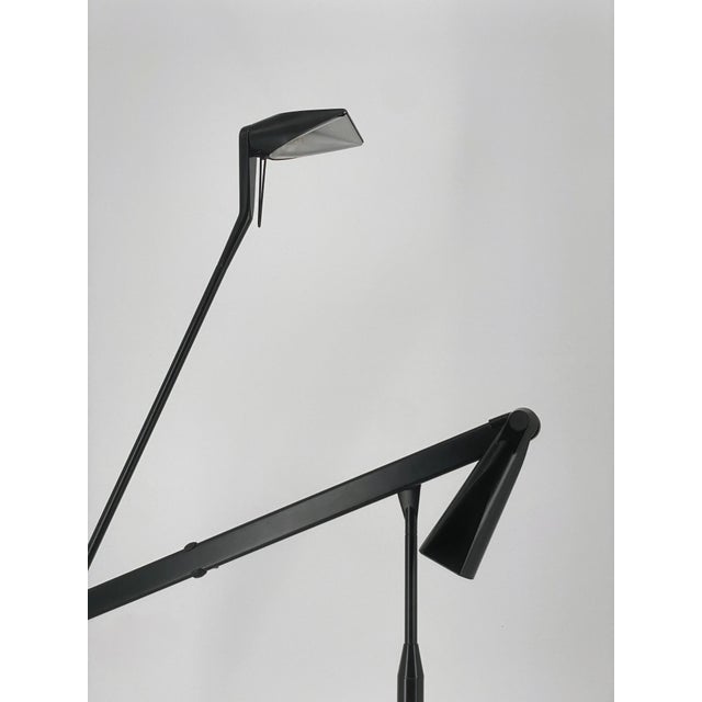 A floor lamp * Manufacturer: Lumina Italia * Designer: Walter Monici * Model: Zelig Terra * Material: Metal, plastic *...