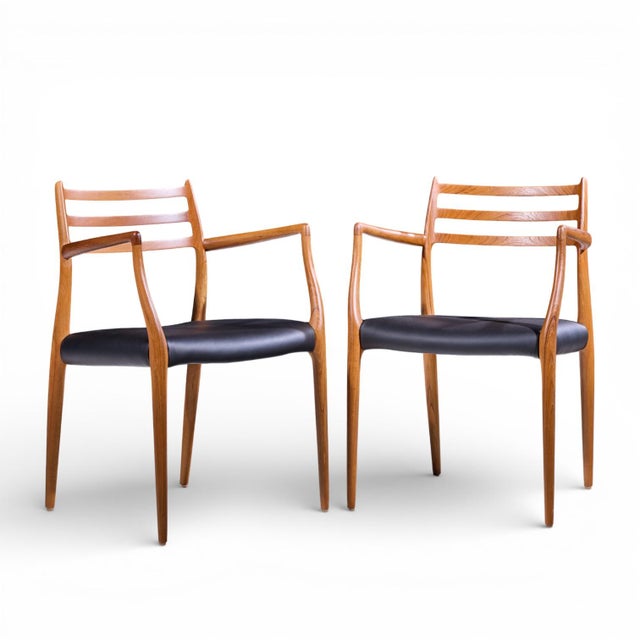 Niels Moller Model 62 Mid Century Danish Teak Captains Chairs - Pair Each chair measures: 21.75 wide x 20.25 deep x 31.25...