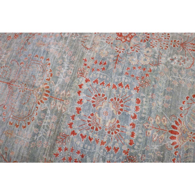 an early 20th Century Persian Sarouk oversize rug with lovely greens and terracottas Details rug no. j3800 size 12'5" x...