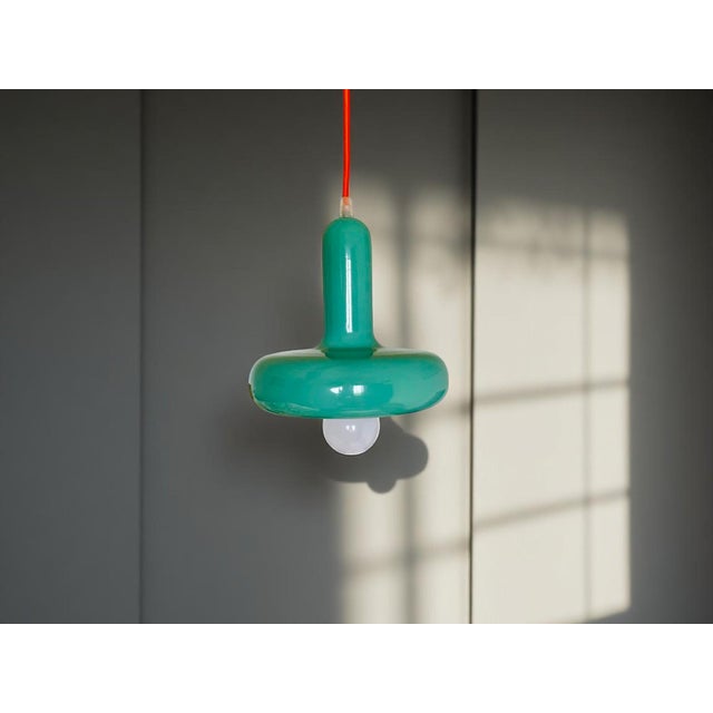 This modern light inspired by the Bauhaus era is one of a kind. We used a vintage metal lampshade, painted it in glossy...