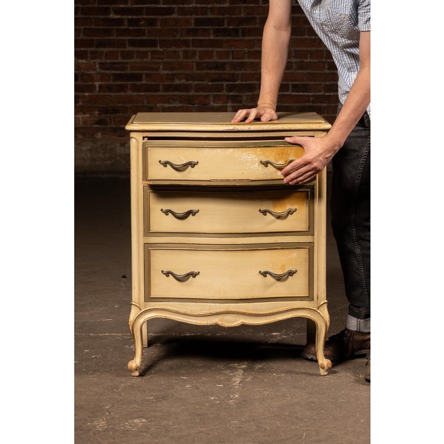 c. 1960s; Drexel Furniture Co. - Drexel, NC Part of Drexel's Touraine Collection, this French Provincial-style bachelor's...