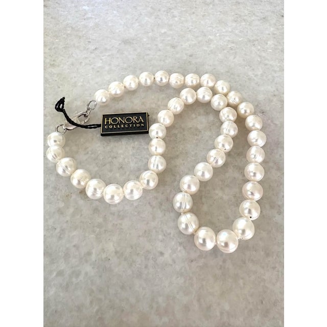 Gorgeous cultured Pearl Necklace With Sterling Silver Clasp hand Knott silk. by Honora.