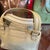 Metal A Vintage Louis Vuitton Beige and White Leather Cruise Hand-Bag For Sale - Image 7 of 18