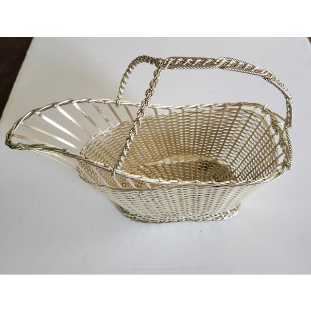 This is the perfect gift for a person who loves to entertain. This vintage wine basket caddy is from around the midcentury...