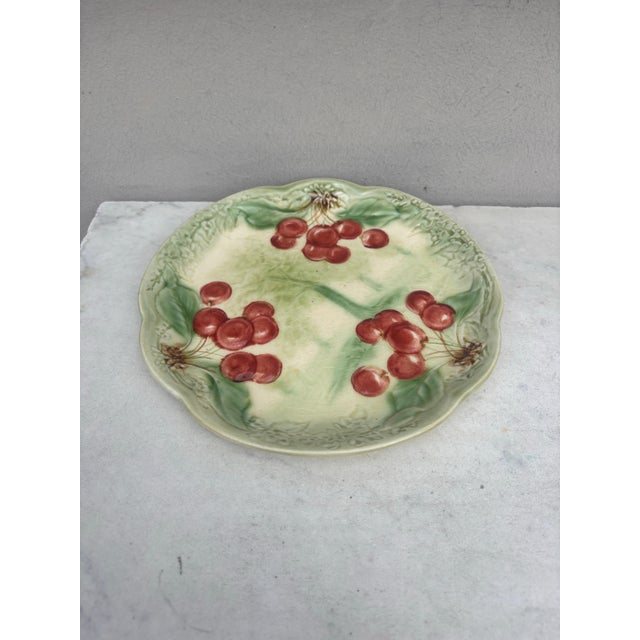 19th century Majolica Cherries Plate signed Choisy Le Roi. Made for Higgins & Setter New York. The Higgins & Seiter...