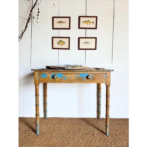 A lovely stripped Victorian faux bamboo side table with it’s original paint showing. Lovely divided drawer, a perfect desk...