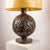 Rare French Art Deco table lamp designed by Edgar Brandt, France, circa 1927. A representative example of the...