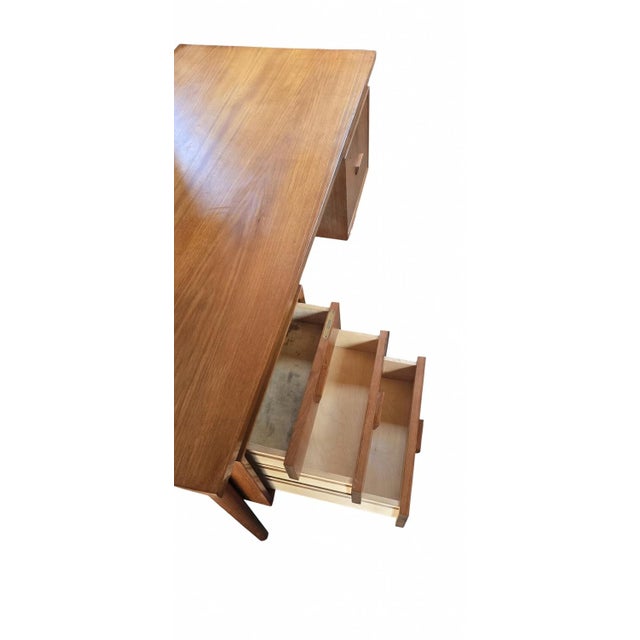 This exceptional Mid-Century Modern teak desk captures the essence of 1960s-1970s Danish design with its clean lines,...