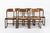 This set of six vintage mid century French modern "Traineau" (Sled) side chairs designed by Emile & Walter Baumann for...