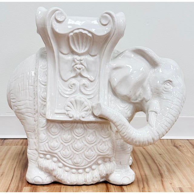 Vintage ivory glazed ceramic elephant garden stool or side table. Wonderful detail with upturned trunk, a symbol of luck...
