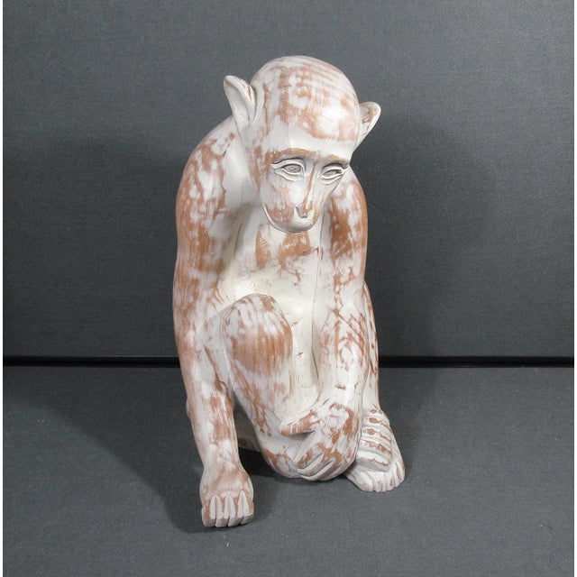 A striking vintage sitting monkey sculpture by Sarreid Ltd., marked Made in Spain on the underside. This large decorative...