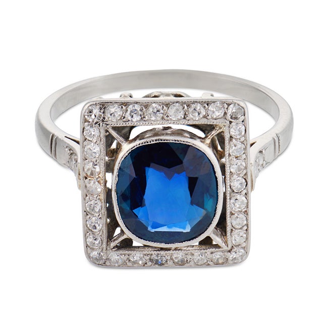 This beautiful French Art Deco sapphire and diamond ring is a refined 1930’s treasure, centered by a GIA-certified cushion...