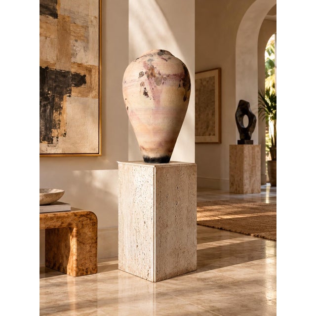 Stunning vintage 1980s Italian Postmodern pedestal crafted from beautiful natural travertine marble in a warm ivory and...