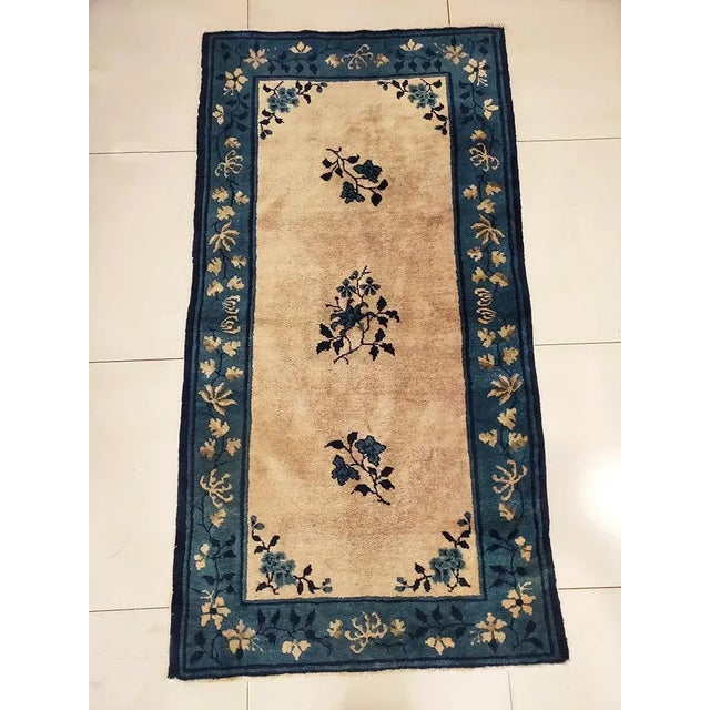 Antique Chinese - Peking Rug, size: 3'0" x 5'10". Chinese - Peking The commercial Peking carpet is a later 19th century...