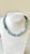 Aquamarine Faceted Beaded Necklace With Gold Tone Clap by Matthew Izzo.